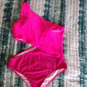 One piece swimsuit, pink and darker pink . Sz large , no known flaws